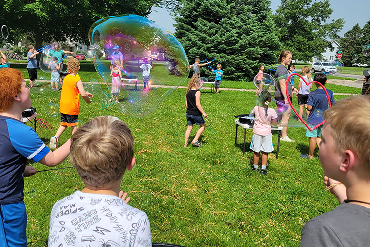 GEP kids playing with bubbles